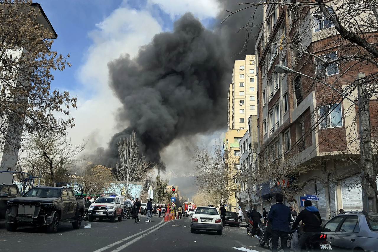 Smoke rising above a street