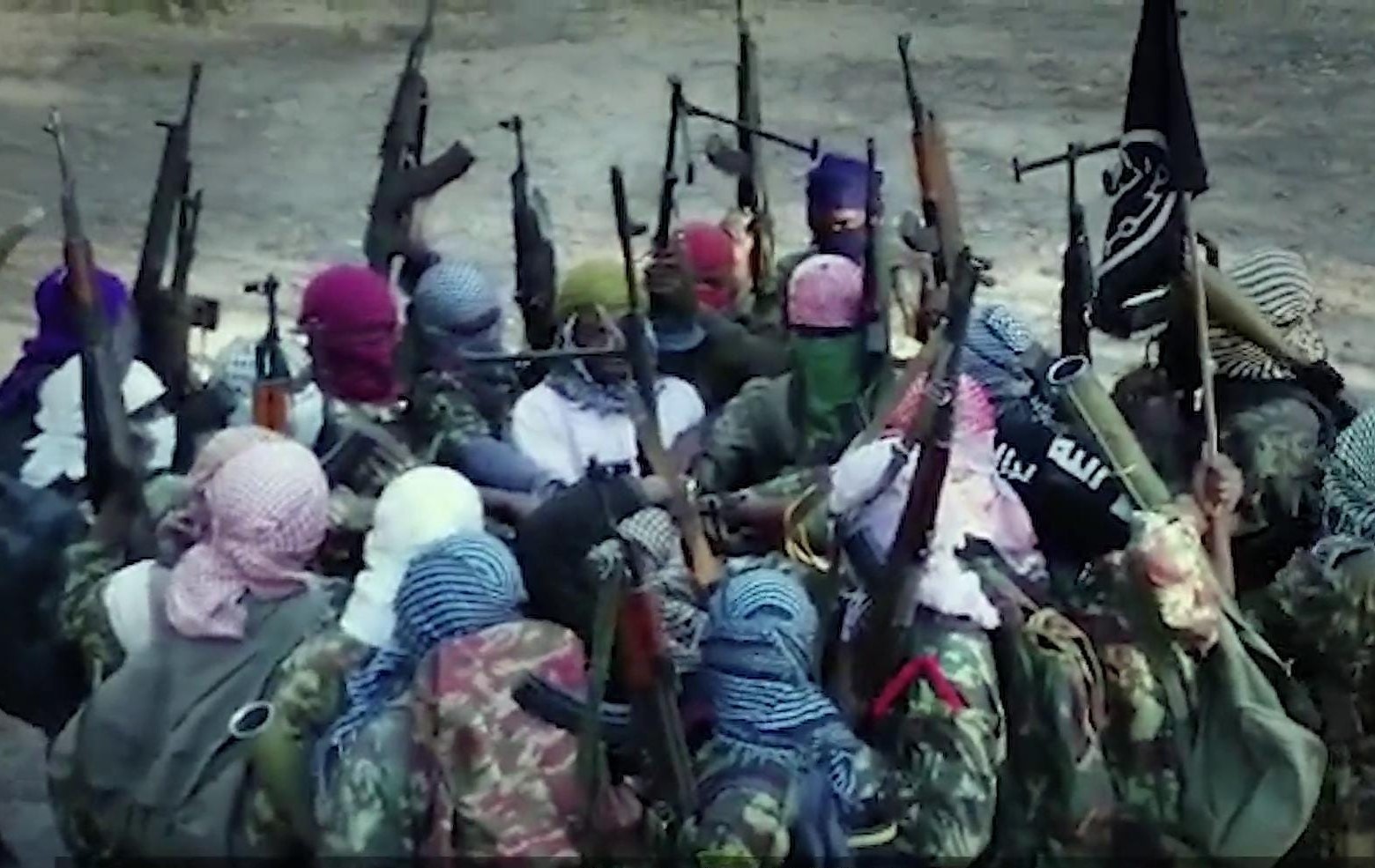 Men holding guns and grenade launchers