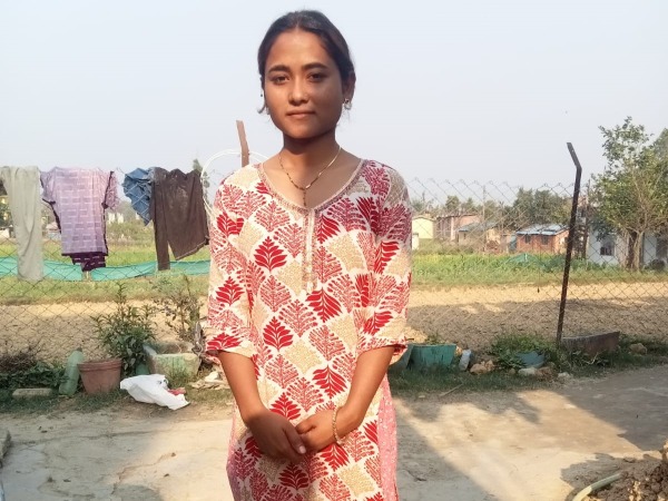An older girl in traditional clothes