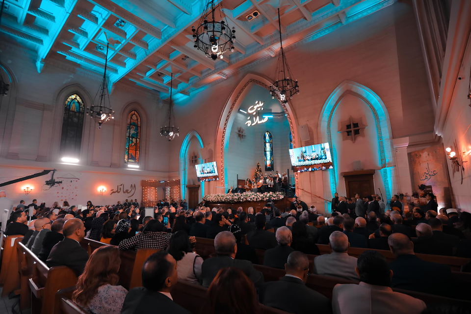 A congregation of people seated during a church service
