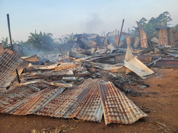The remains of buildings that have been set on fire and destroyed