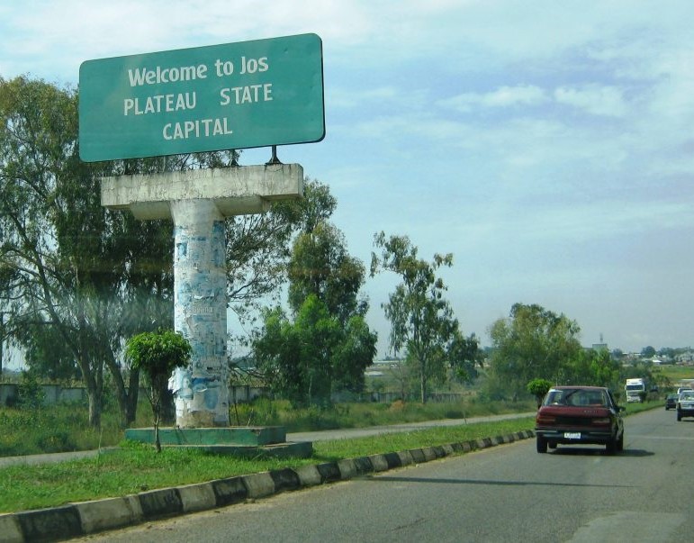 A sign that says: Welcome to Jos PLATEAU STATE CAPITAL
