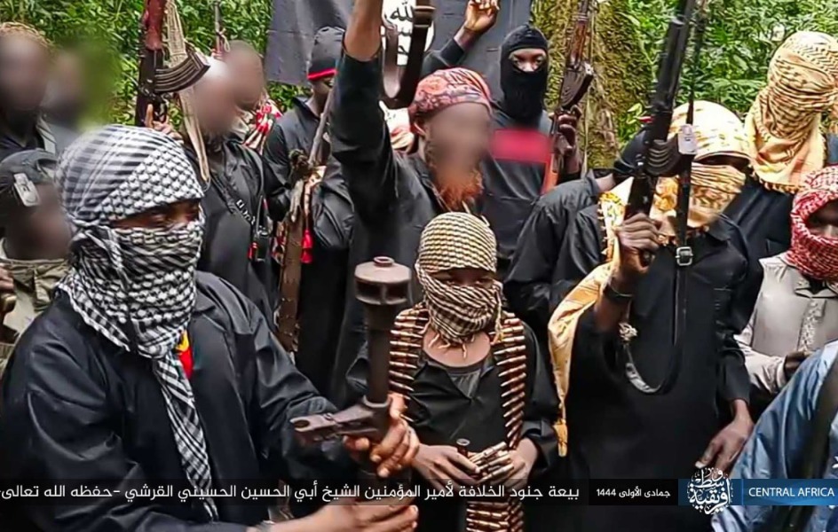 Men with scarves over their faces holding weapons