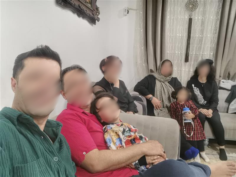 A group of people in a living room