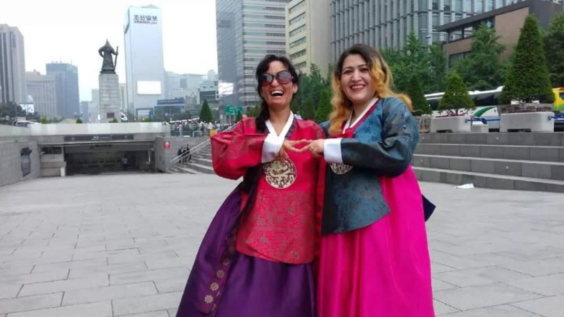 Vangai and her friend posing for he camera in South Korea following her operation.